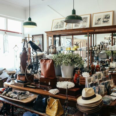 Charming vintage store interior with diverse fashion, accessories, and decor items on display.